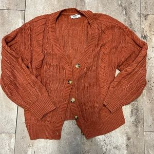 Burnt orange button up sweater, size large